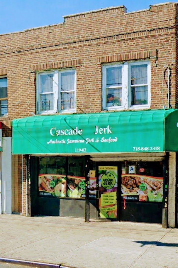 Jamaican restaurant interior with warm, casual seating.