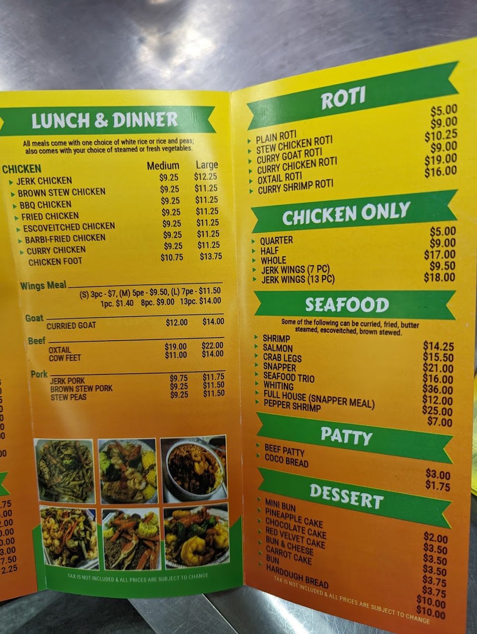 Printed menu with jerk chicken and curry goat.